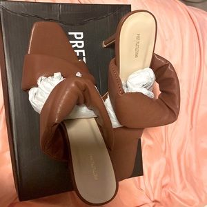 Brand new never worn chocolate sandal heel